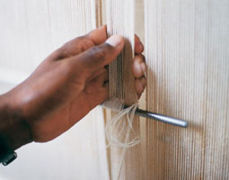 hand knotting an area rug