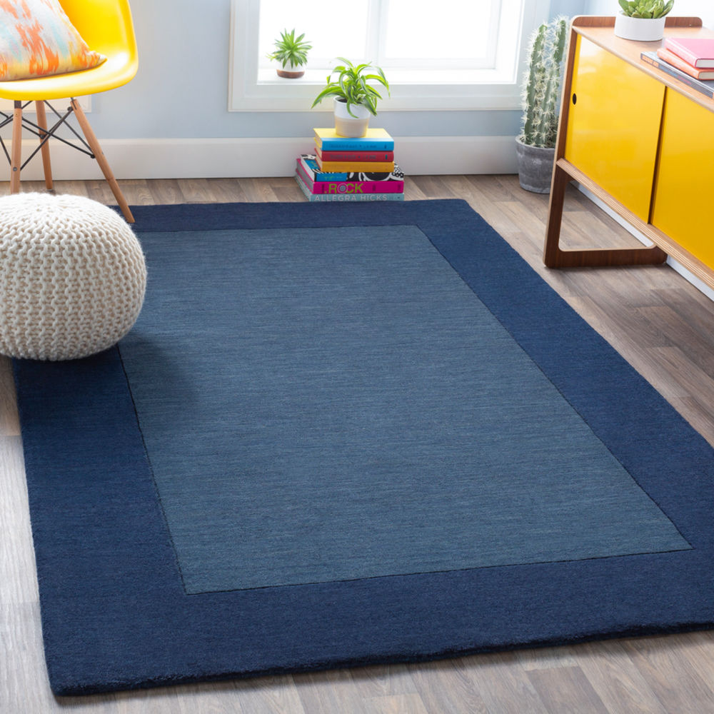 Surya Mystique M309 Navy Bordered Wool Rug from the Solid Rugs