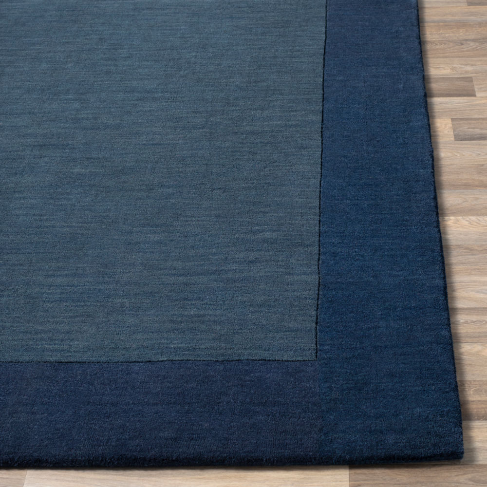 Surya Mystique M309 Navy Bordered Wool Rug from the Solid Rugs